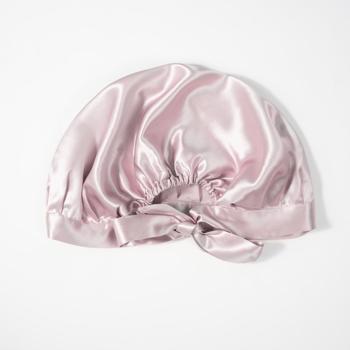 Luxuriöser seiden Schlafmaske aus zarter rosa Seide, perfekt für einen erholsamen Schlaf.