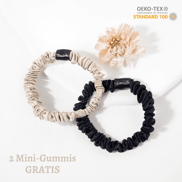 Stretchige Seiden-Gummis aus Satin, beige und schwarz, für luxuriöse Haaraccessoires.