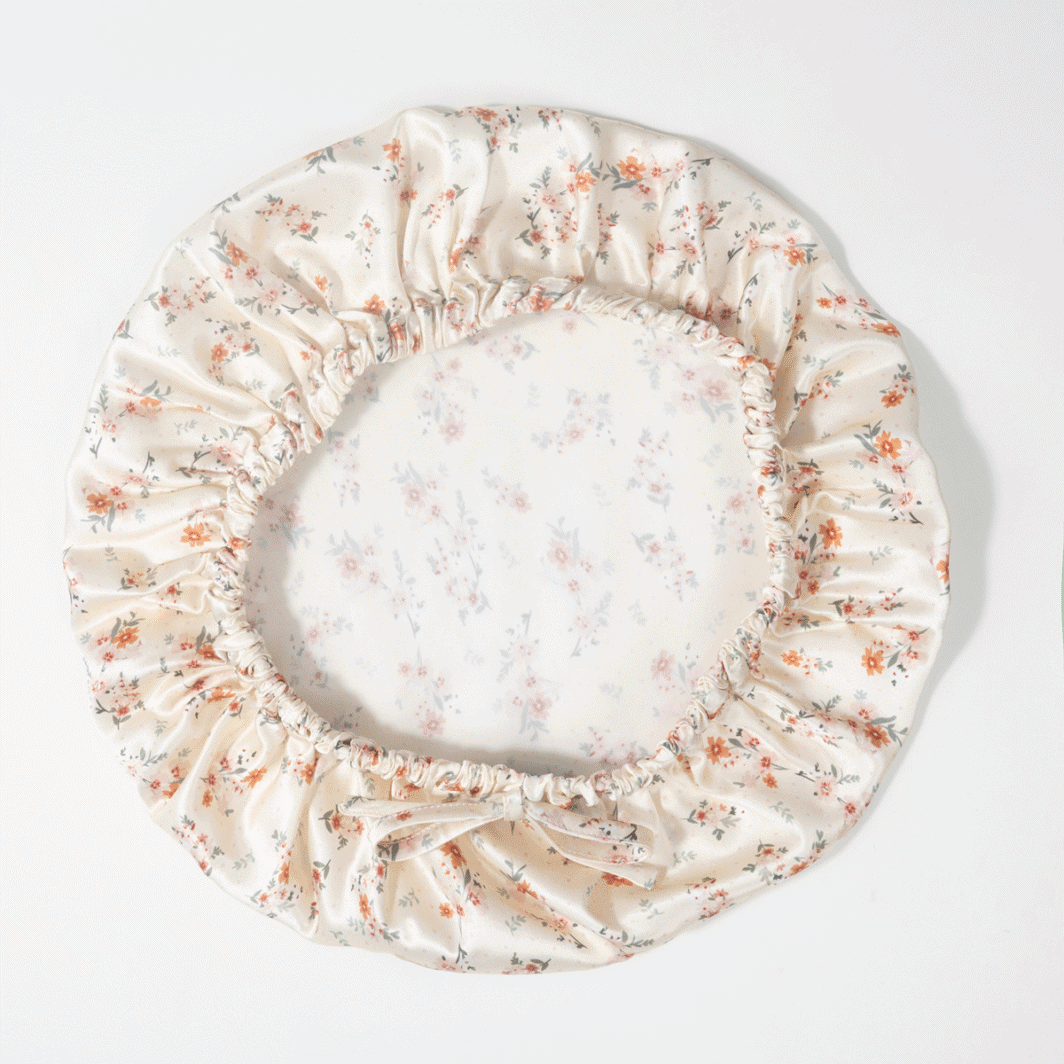 Seidenkissenbezug mit Blumenmuster, runder, elastischer Rand aus Seide, eleganter Kuschel-Look der Marke Lovesilk.