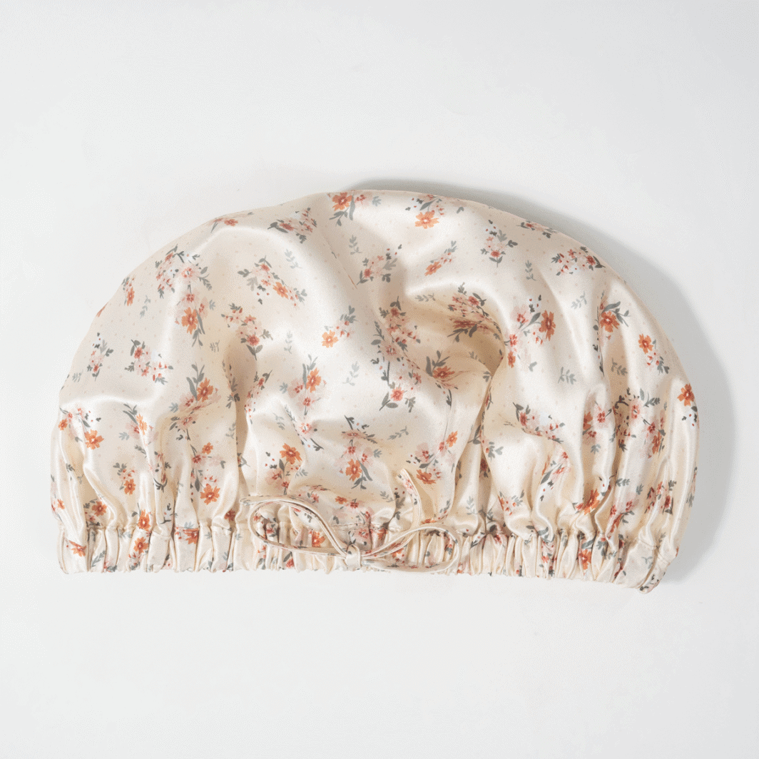 Seidenkissenbezug mit floraler Optik, aus hochwertiger Seide, handgefertigt für luxuriösen Schlafkomfort.