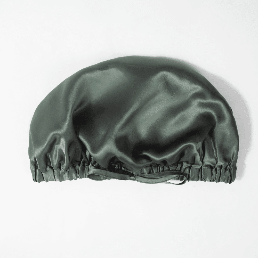 Luxus Seidenschal in dunklem Grau, weiches und elastisches Material, stilvoll und angenehm auf der Haut.