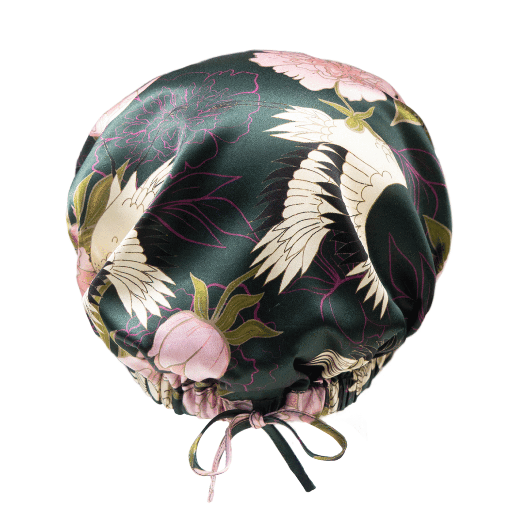 Seidenschal mit Kranichen, floralen Mustern und edler Satin-Oberfläche.