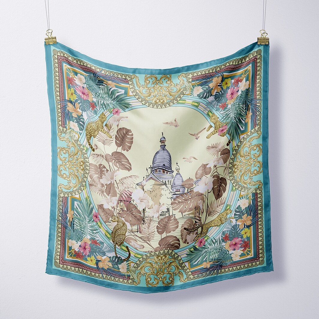 Seidentuch aus Maulbeerseide in Blau mit goldenen und bunten Mustern.