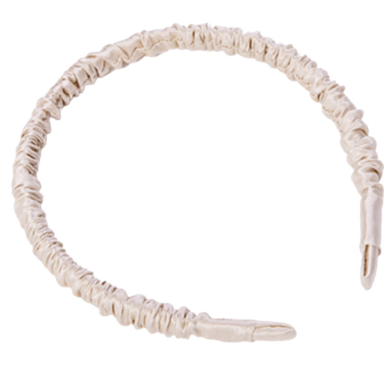 Seiden-Haarband in Ecru von LoveSilk. Mit elastischem Band.
